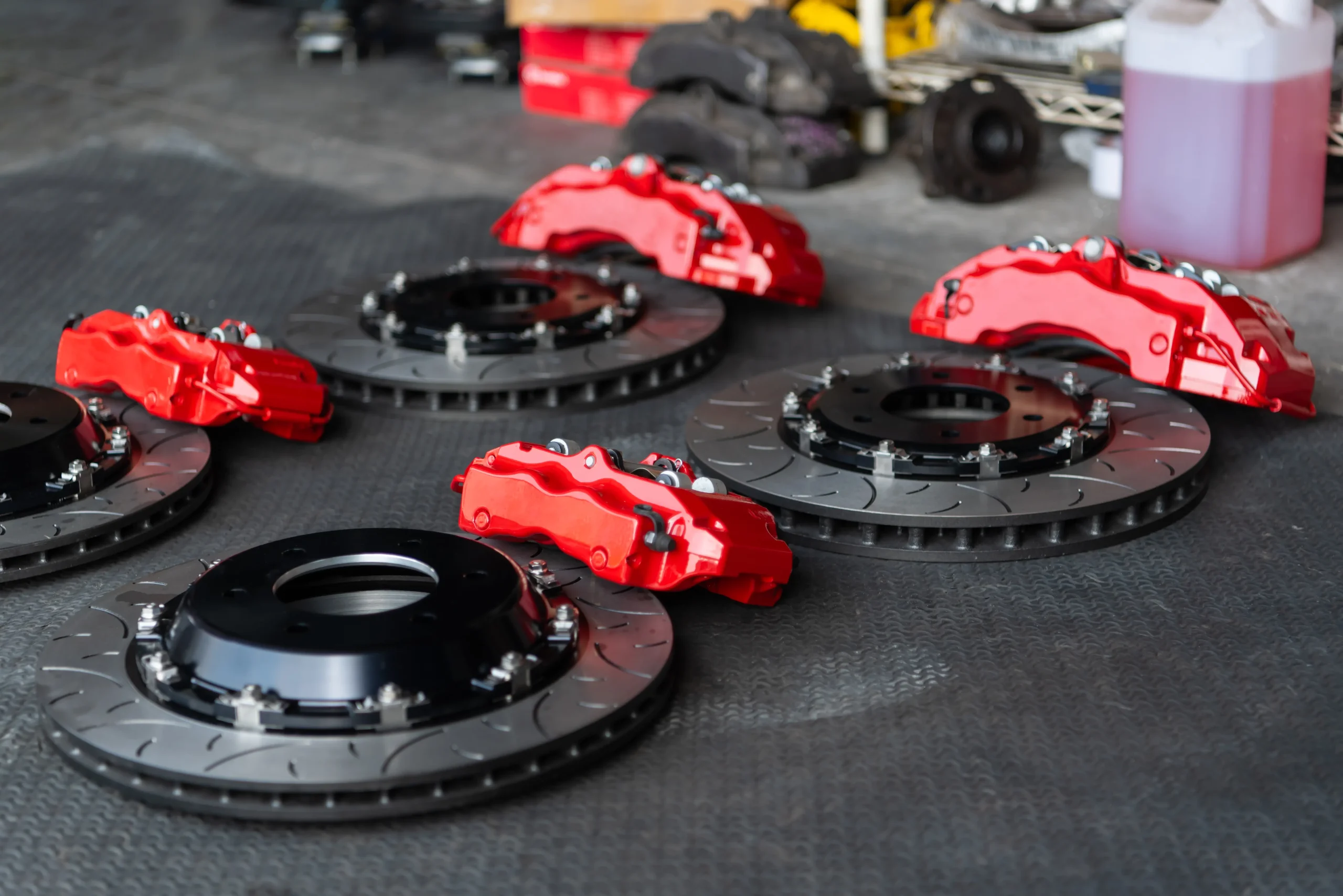 car-mechanic-serviceman-disassembly-checking-disc-brake-asbestos-brake-pads-fi